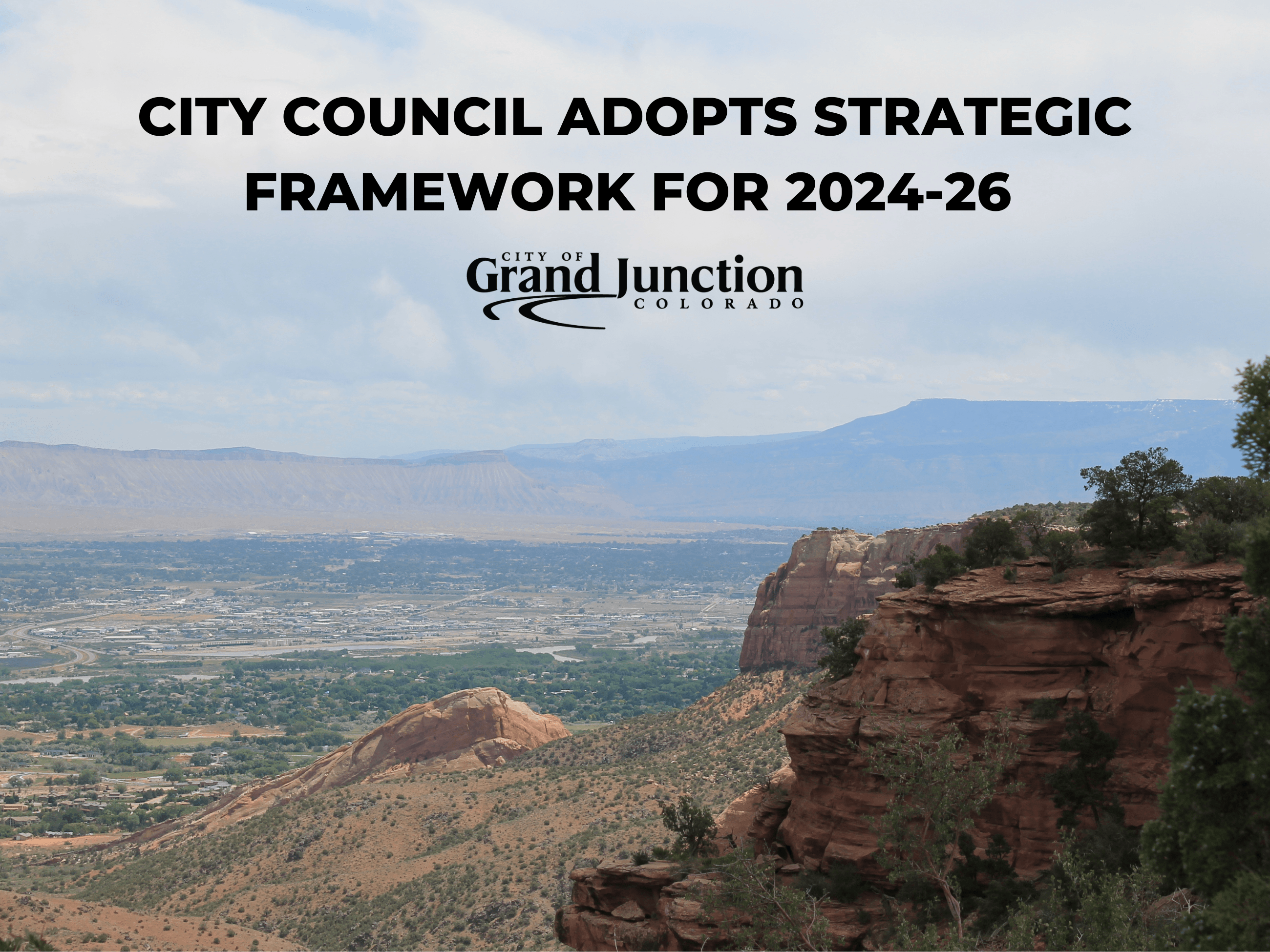Colorado National Monument looking toward Grand Mesa. Outdoors. Text on graphic. 