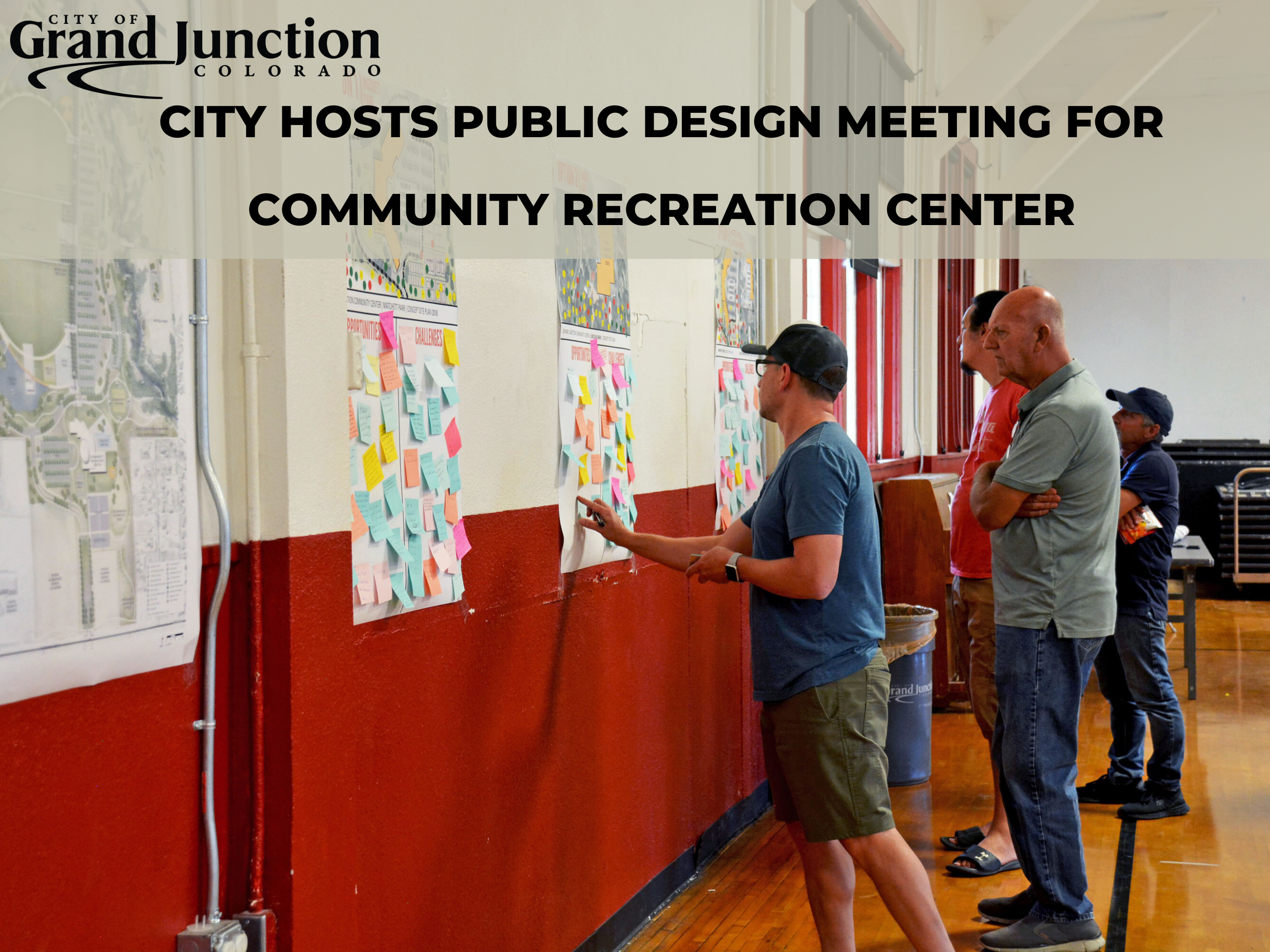People standing indoors adding sticky notes to boards on the wall. Text on graphic. 