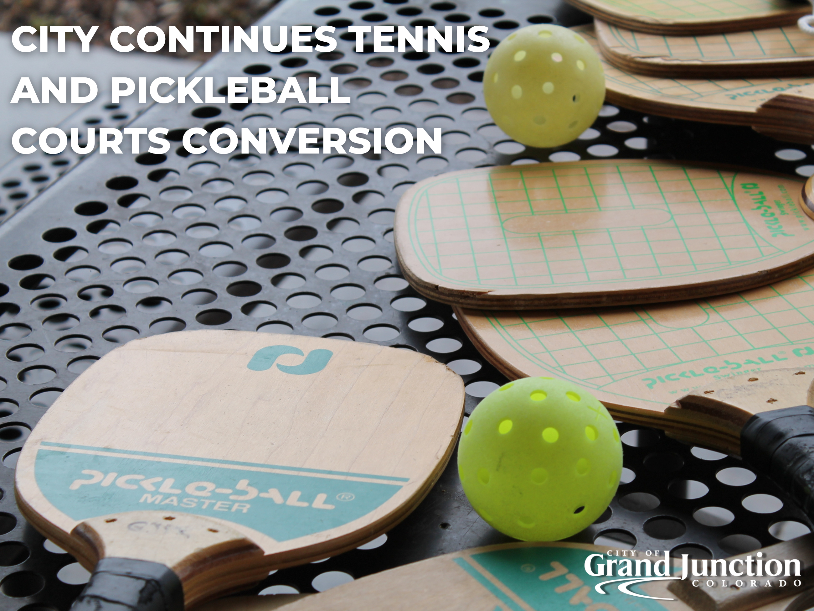 Pickleball paddles and balls resting on top of picnic table. Text on graphic. 