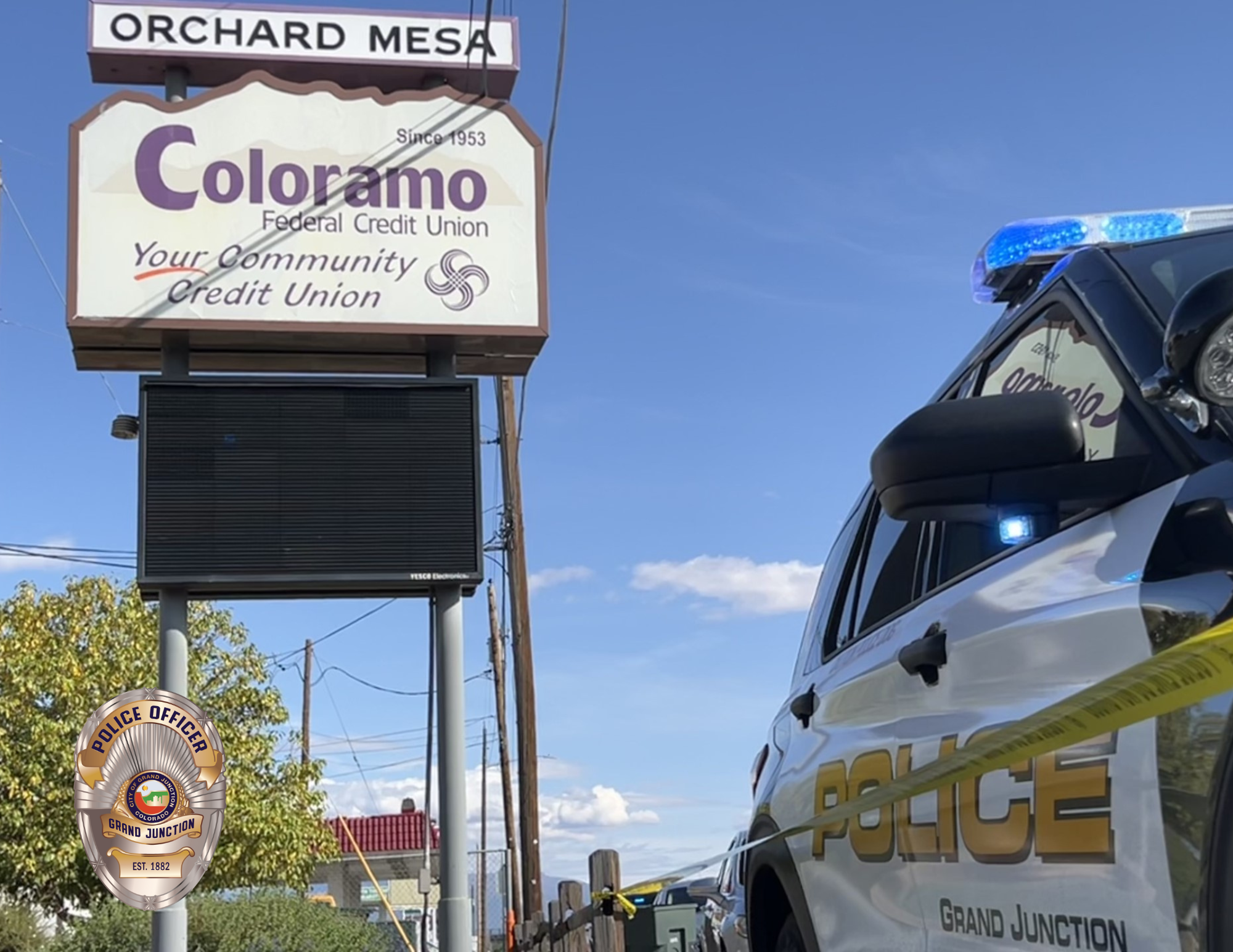 police car parked at Coloramo Federal Credit Union