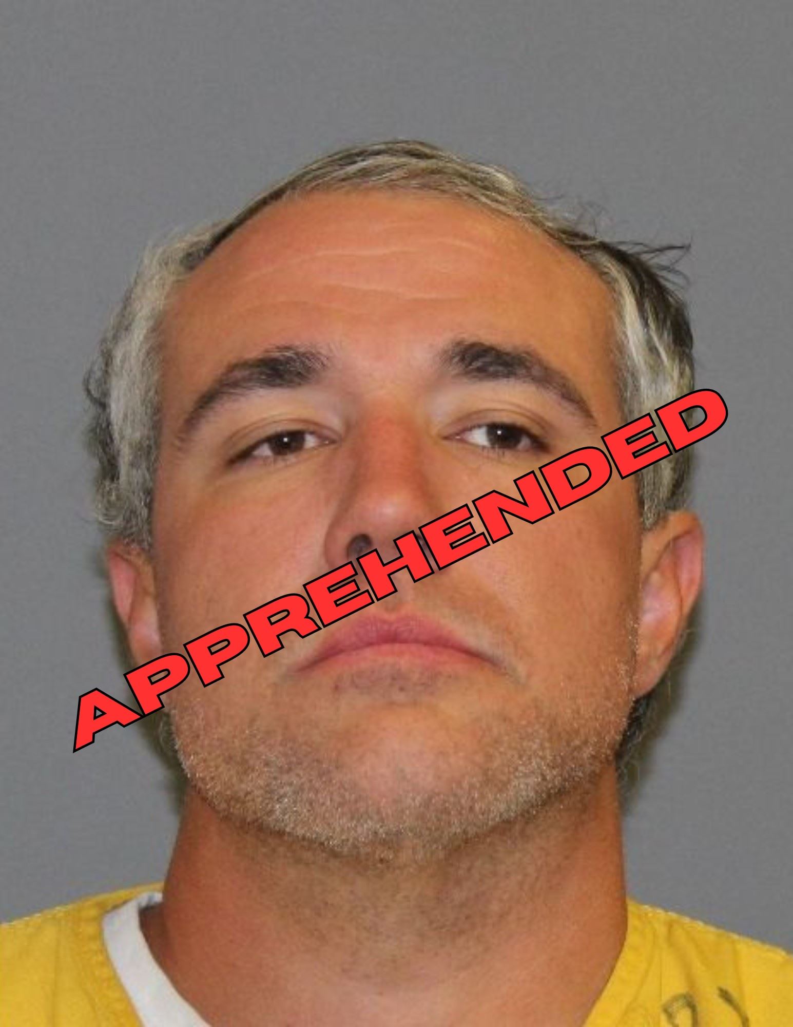 JEFFERY DOWNING BOOKING PHOTO with the words 