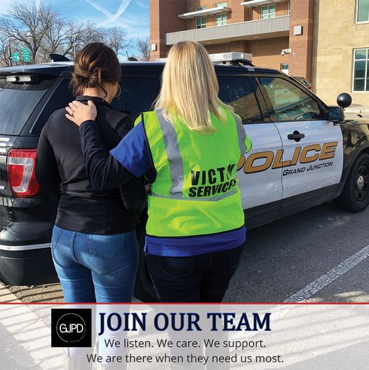 GJPD Victim Services: Join Our Team. A Victim Services volunteer with her hand on victim's should