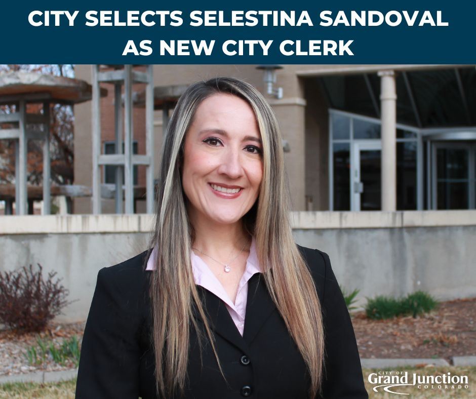 Image of new City Clerk, Selestina Sandoval outside in front of City Hall.