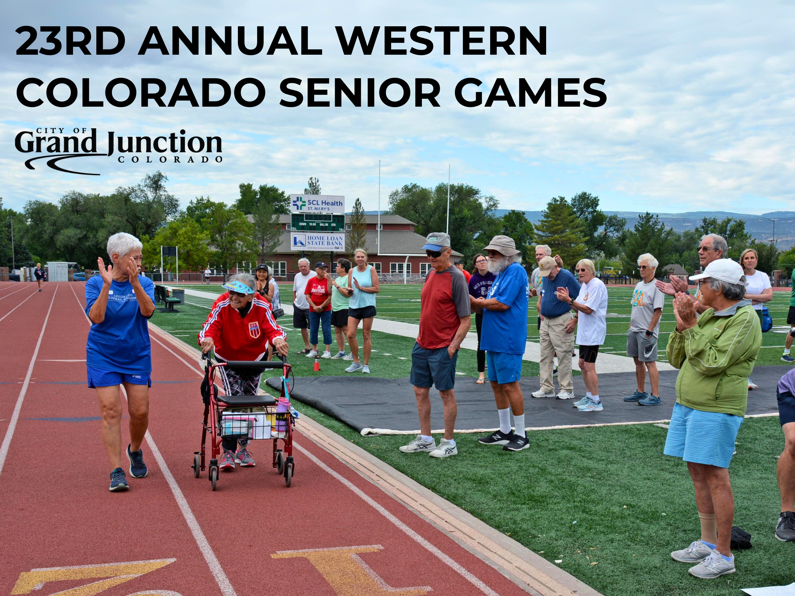 Participants walking down the track at Stocker Stadium during the Senior Games
