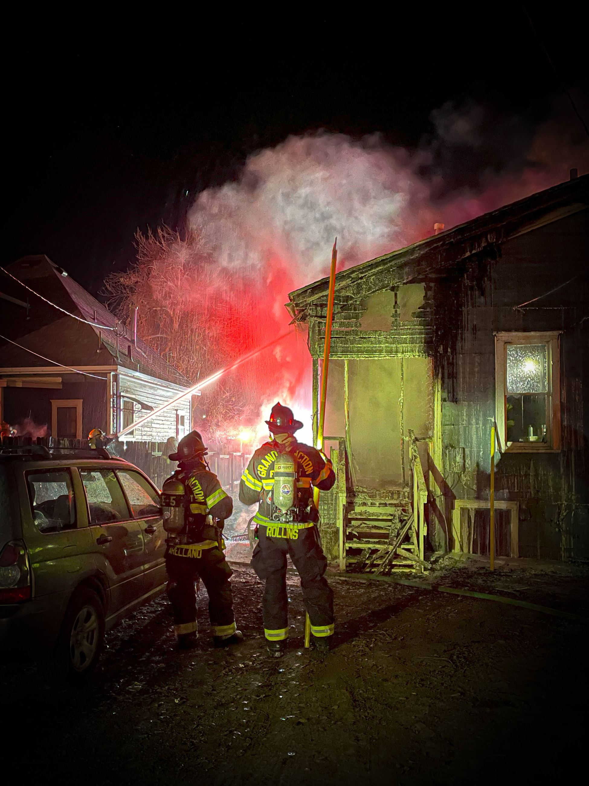 GJFD firefighters extinguish a house on fire on Colorado Avenue