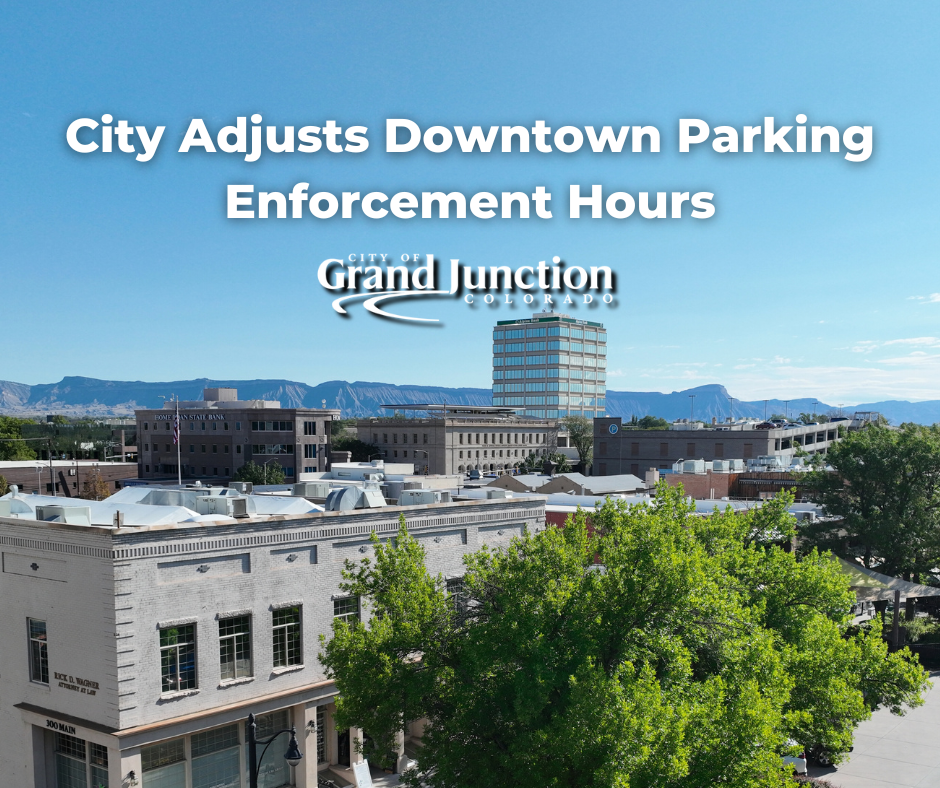 Skyline view of downtown Grand Junction with text on graphic