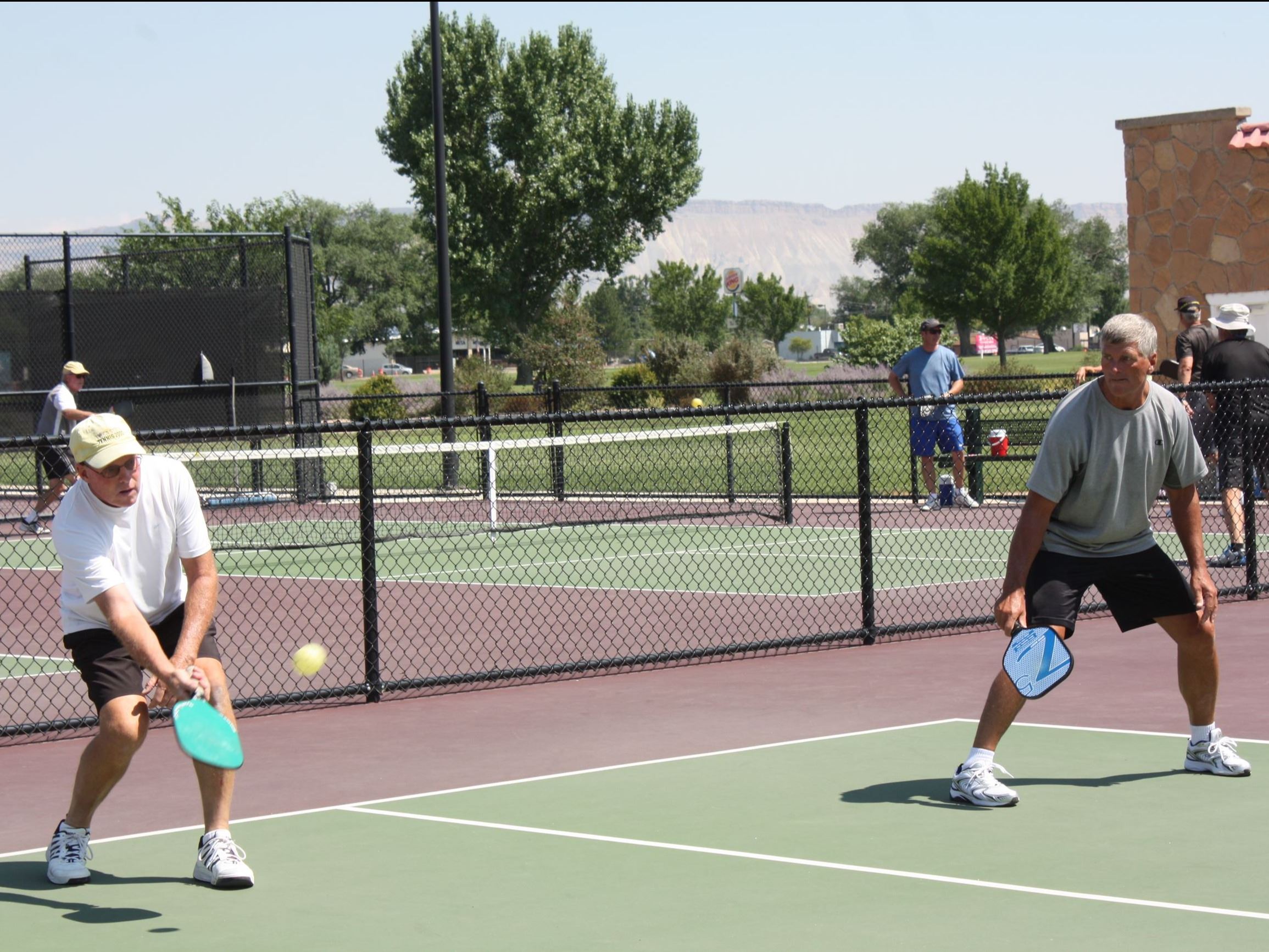 Women playing pickleball