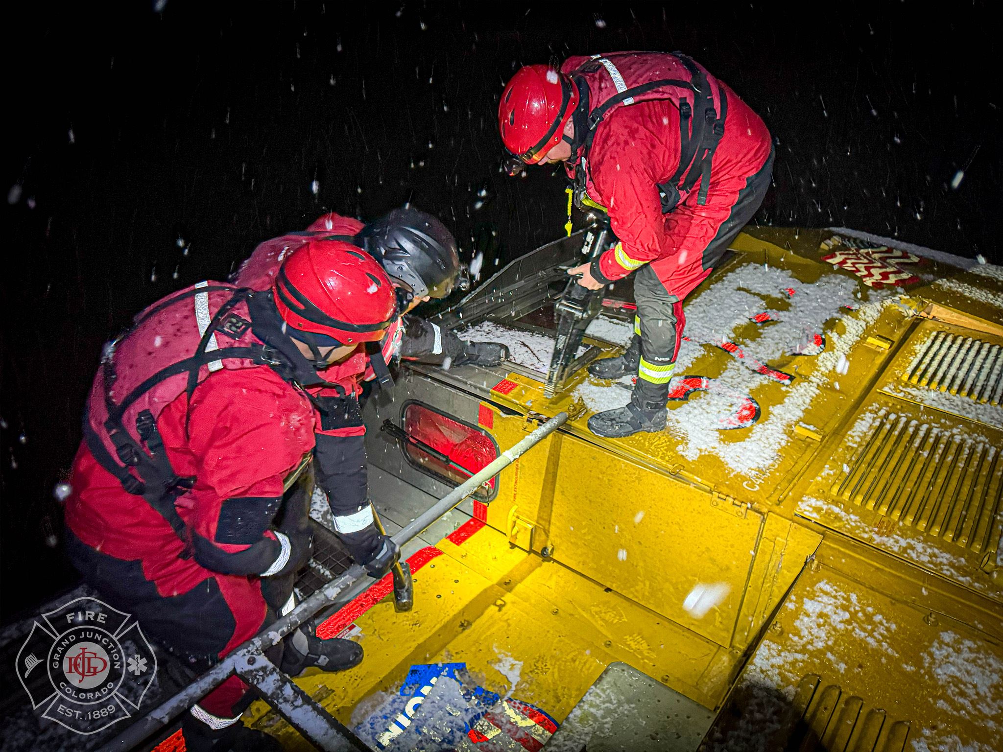 GJFD firefighters access a train engine during an incident