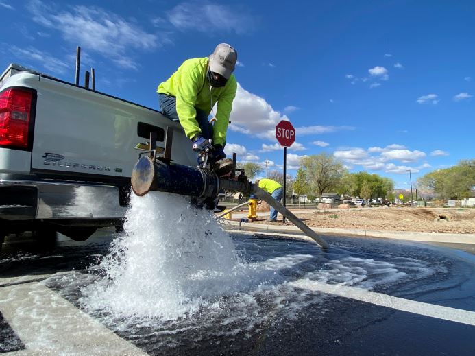 Crews conducting hydrant flushing operations
