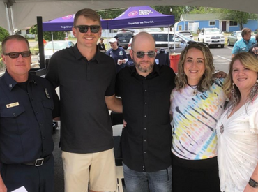 Group picture with survivor