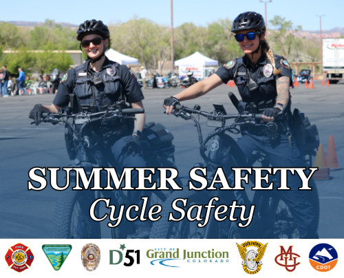 Two GJPD bike officers smiling