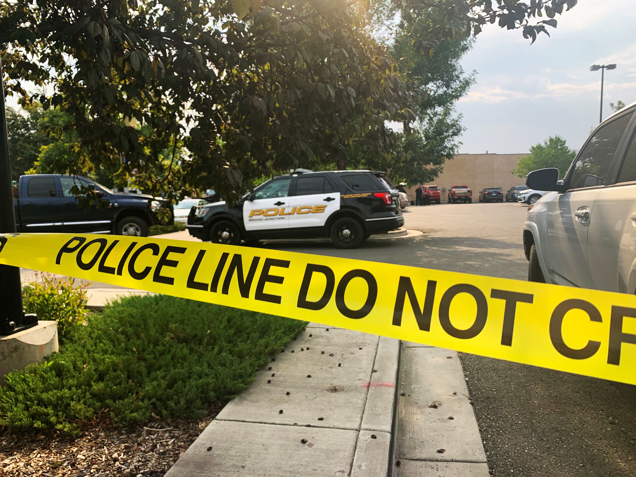 GJPD Patrol Vehicle surrounded by yellow "DO NOT CROSS" tape